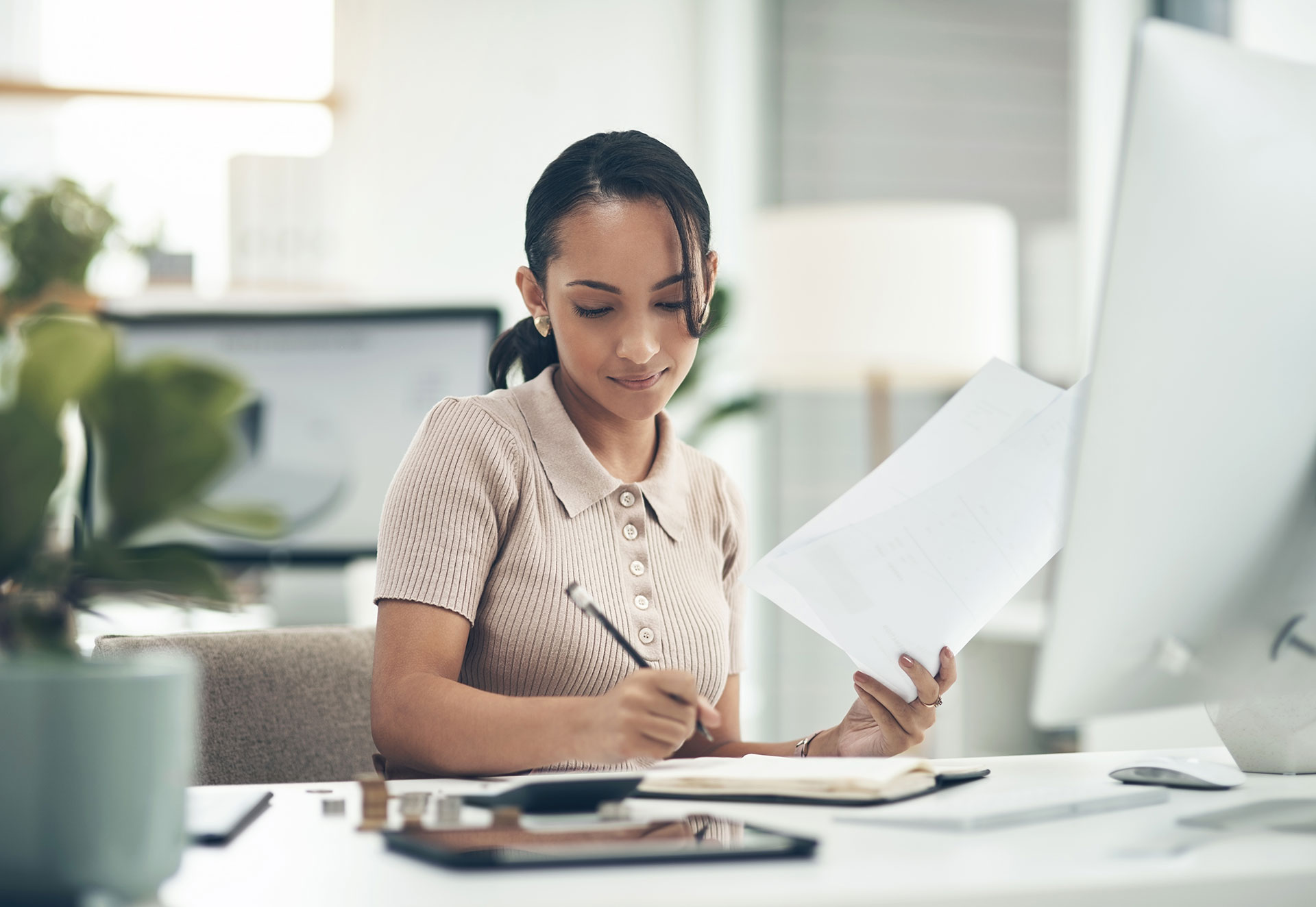 woman on a desk working